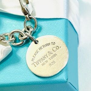 Tiffany & Co. Please Return To Silver Round Charm Bracelet